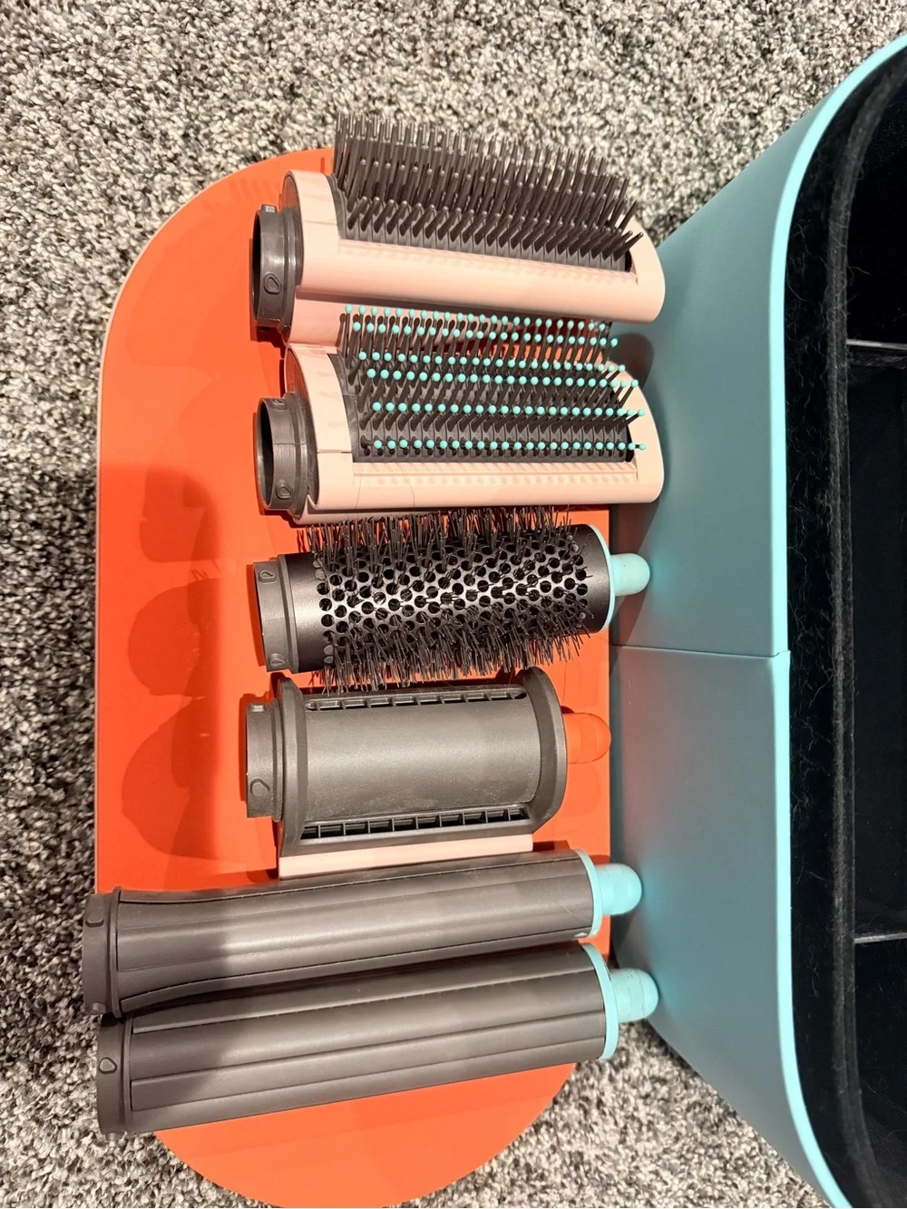 Dyson multi-attachment styler in aqua, coral and rose gold